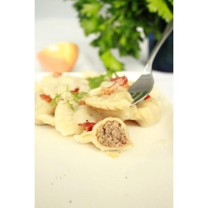 small pierogies, dumplings, uszka press/maker. Makes four small pierogies at once