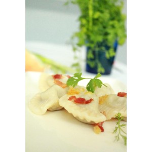 small pierogies, dumplings, uszka press/maker. Makes four small pierogies at once