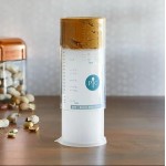 Pampered Chef Measure All Cup 2225 - Adjustable Plunger Design, Clear Measuring Cup