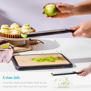 Dreamfarm Ozest Self-Cleaning POP-Button Zester for Fine, Fluffy Citrus Zest, Cheese, Nut, & Spices with Non-Slip Silicone Foot - 1mm Zester, Black/Green