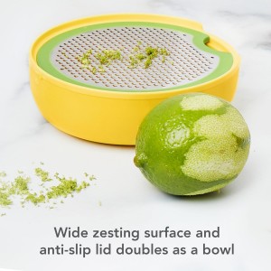 Tovolo Citrus Juicer and Zester Manual Lemon Squeezer with Measuring Cup and Built In Strainer, Easy Clean BPA Free Zester Grater with Handle for Fresh Citrus Dual Reamers for All Fruit Sizes