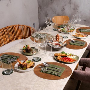 ADRIMER Placemats, Heat Resistant Round Placemats Set of 8 Washable, Waterproof Table Mats, Wipeable Faux Leather Place Mats for Kitchen, Dining Room, Turmeric Brown