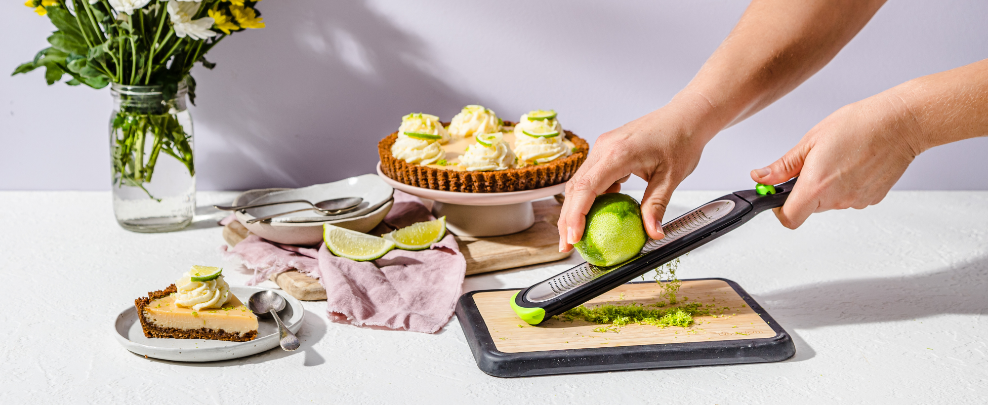 Dreamfarm Ozest Self-Cleaning POP-Button Zester for Fine, Fluffy Citrus Zest, Cheese, Nut, & Spices with Non-Slip Silicone Foot - 1mm Zester, Black/Green