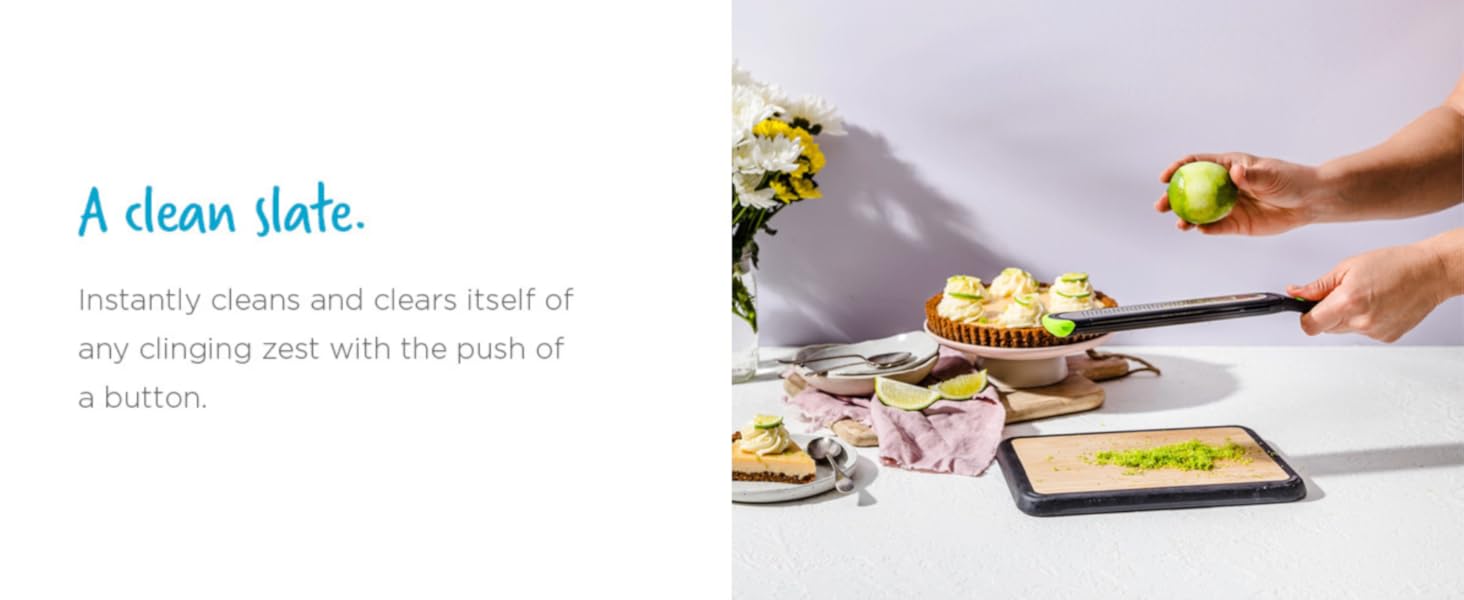 Dreamfarm Ozest Self-Cleaning POP-Button Zester for Fine, Fluffy Citrus Zest, Cheese, Nut, & Spices with Non-Slip Silicone Foot - 1mm Zester, Black/Green