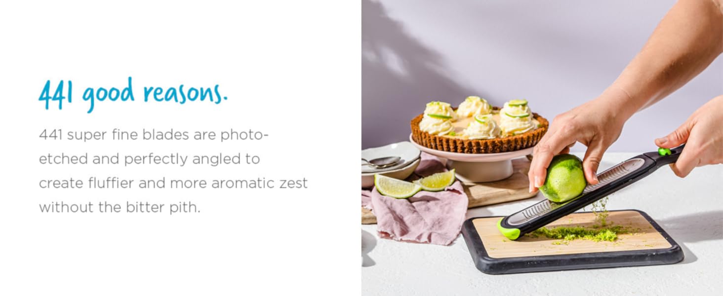 Dreamfarm Ozest Self-Cleaning POP-Button Zester for Fine, Fluffy Citrus Zest, Cheese, Nut, & Spices with Non-Slip Silicone Foot - 1mm Zester, Black/Green