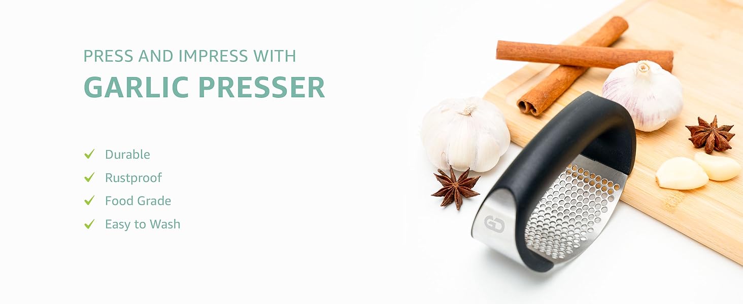 Garlic press rocker, crusher, mincer tool stainless steel with a Garlic Peeler, spatula, and Brush extract more Garlic Paste. The Garlic Mincer Tool Squeezes, Extracts, Crushes