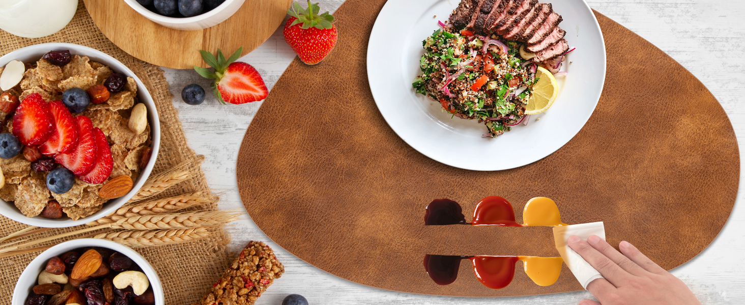 ADRIMER Placemats, Heat Resistant Oval Placemats Set of 8 Washable 12 x 17 Inch, Waterproof Table Mats, Wipeable Pu Place Mats for Kitchen, Dining Room, Turmeric Brown